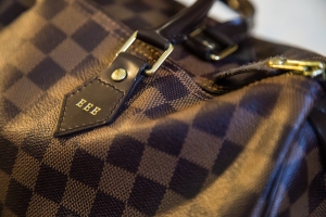 "EEE" Louis Vuitton celebrated 100 years on the Champs Elysee by putting its owners initials on their new bags - photo by emily elizabeth enns